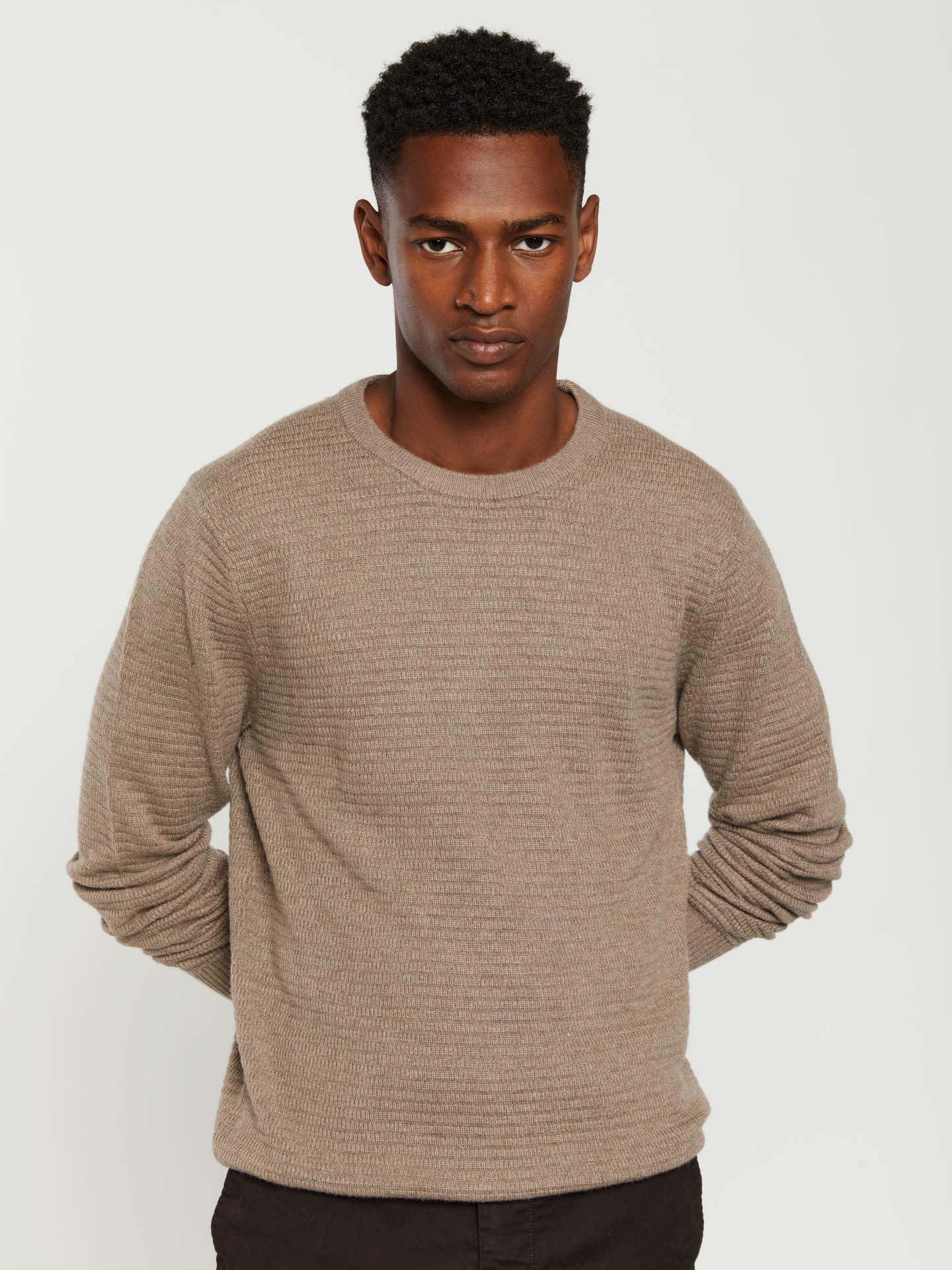 Crew neck sweater with fancy knitting